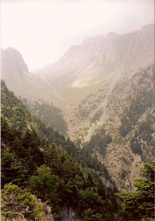 This photo is taken from the same path but now it is showed the upper part of the ravine and some of the tallest peaks of Parnassos