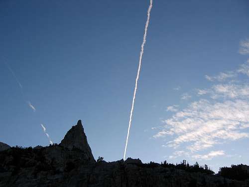 High contrail over camp.