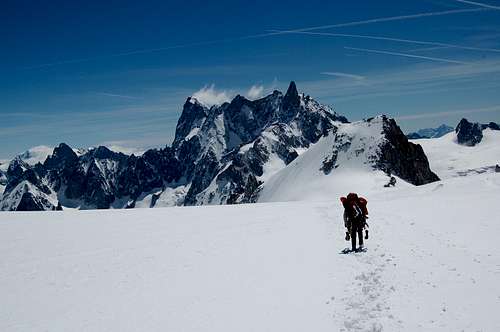 Trekking towards the NE face of Mont Blanc du Tacal with Dent du Géant in the distance