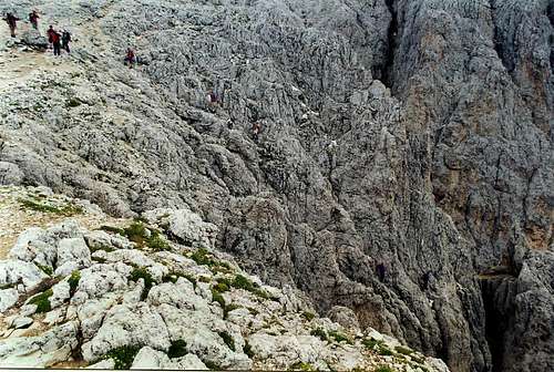 A group of climbers coming out from Ferrata Santner, at the namesake Pass