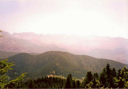 Peak Korakas left in the background and the southern ridgeline of Vardoussia from Tsouka peak(1610m)