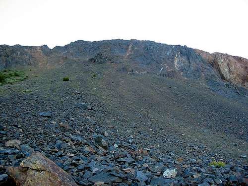  The loose talus at the base...