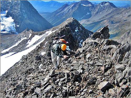 Luke ascending the summit ridge