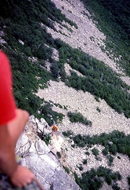 Climber ascends 4th pitch of...