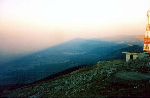 The shadow of the peak as it extends to the east-northeast.Erythres can be seen in the middle of the photo