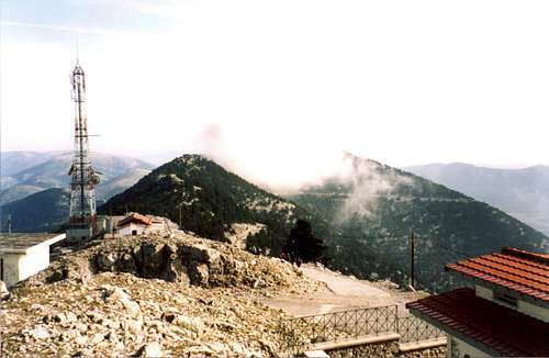 The radiator in the area of the peak,the ridgeline extending to the east and the peak Treis Korifes inside the clouds