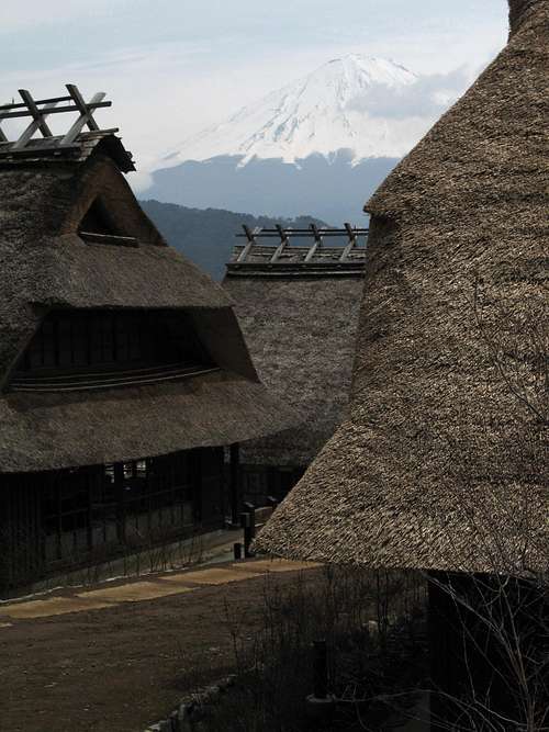 Mount Fuji seen from traditional japanese houses close to kawaguchi lake, 04/20/07