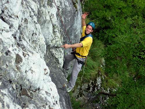 The very strong climber is holding himself with one finger :-)