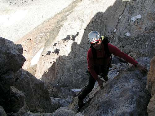Mark Newcomb guides the step over on the Grand's Upper Exum Ridge