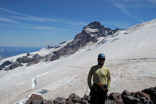 Chat - back at the campsite, with Little Tahoma behind him
