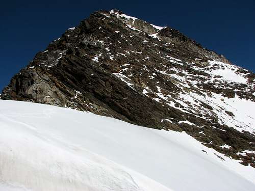 View back to the SE face and SE ridge (on the left) of Monte Nevoso