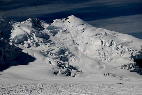 TAT plane against the surrounding Alaska Range peaks above Second Shot glacier.