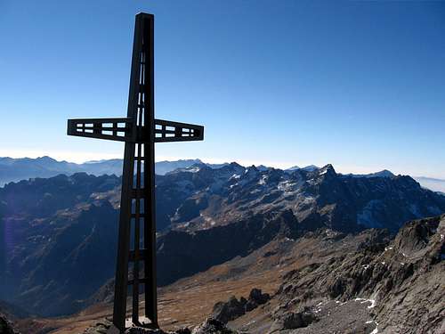The cross on the top.<a href=http://www.summitpost.org/mountain/rock/349863/pizzo-ligoncio.html>Pizzo Ligoncio</a> is visible in the background.