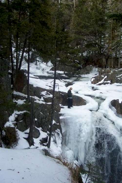 Standing on a partially frozen waterfall...