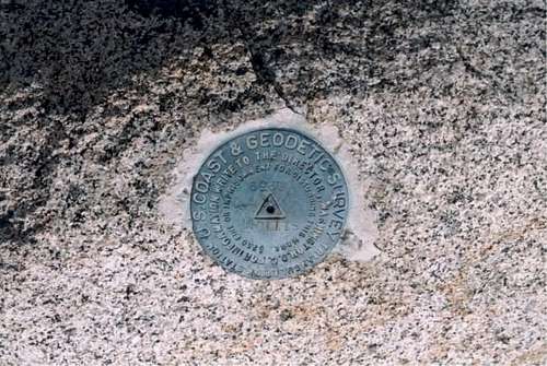 The summit marker indicated a...