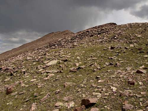Approaching the summit in storm lighting
