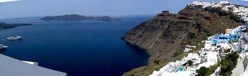 Panorama of the clear blue waters off the island of Santorini