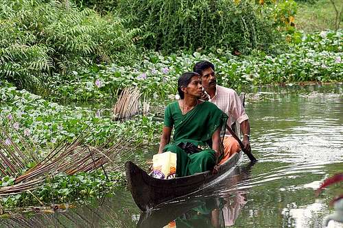 Couple on daily living toure - Backwaters of Kerala