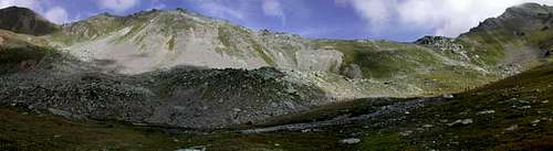 Panoramic view of the ridge lowering to Colle Finestra <i>(2729m)</i> from Mont Fallere <i>(3059m)</i>