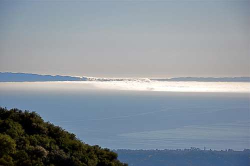 Fog pouring over the low point of Santa Cruz Island.