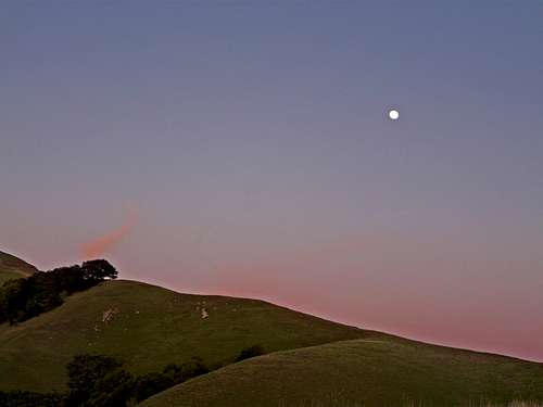 Moon over the ridge at dusk