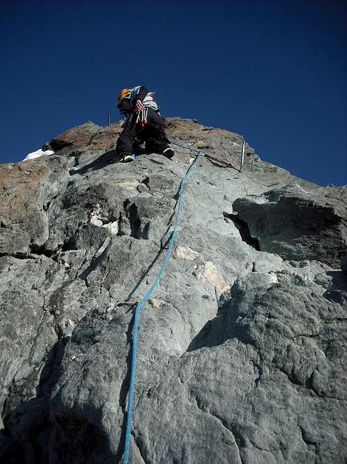 Natalia on Grossglockner summit rocks