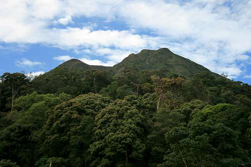 Gunung Sinabung rising above her forested slopes