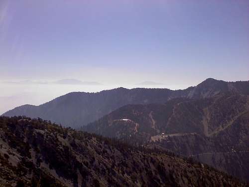 Looking ESE... San Gorgonio is poking through the clouds on the left, San Jacinto on the right