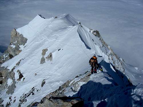 Makalu: Mick Parker climbing down the summit ridge