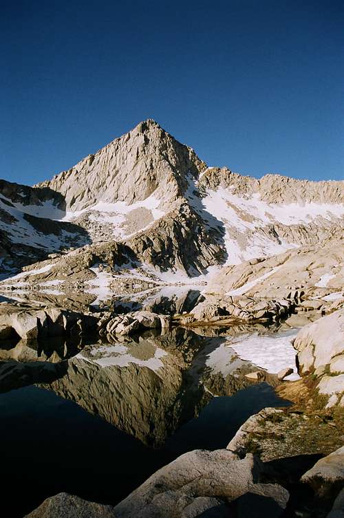 Columbine Lake's reflection of Sawtooth Peak, early morning