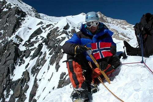 Norwegian on the ridge with flag
