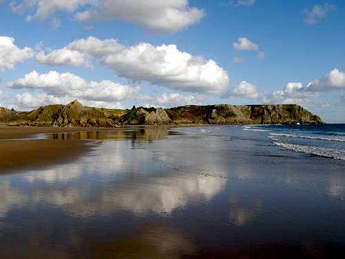 Three Cliffs Bay sand reflections