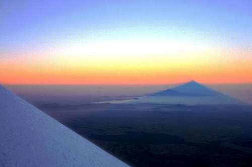 Pico de Orizaba casting its shadow at sunrise