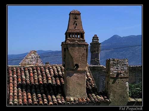 Old chimneys on the roofs of...