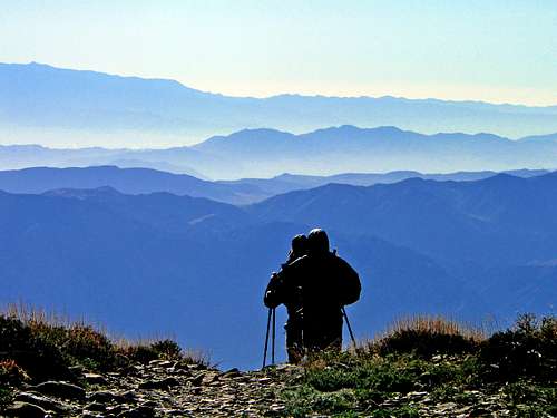 Hikers cresting the Panamint Range at dawn