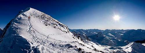 Panorama - Piz d'Agnel, sun and mountain climber