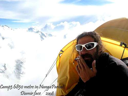 mohamad ,my crazy friend smoking in camp of 3 , 6850 m , nangaparbat...by 8126m