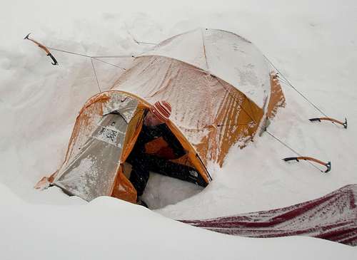 Checking the weather at Denali's 14.000 camp