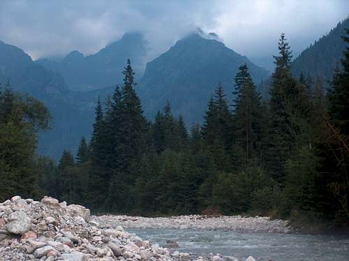 The capricous Bela Voda river carries masses of white granite peebles and boulders after every flooding