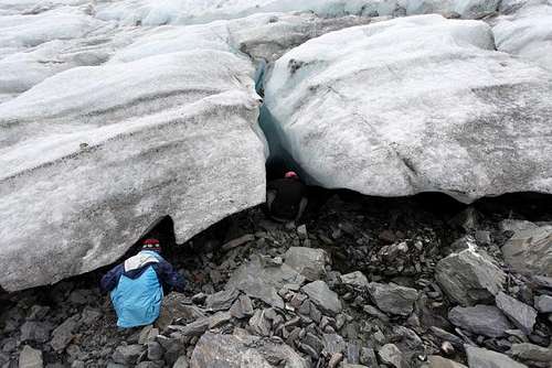 checking out the glacier's ice caves