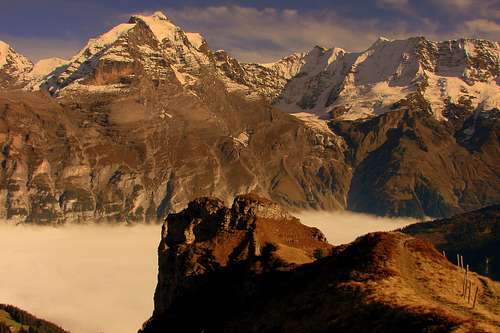 Jungfrau and Bryndli over clouds