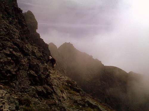 Traverse to the main summit.