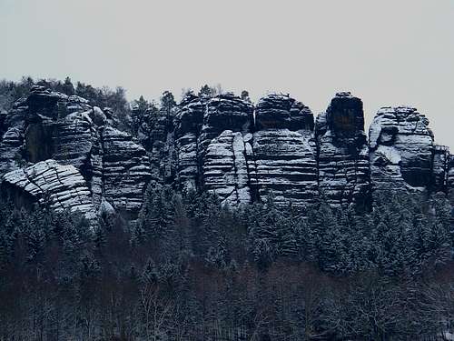 The cliffs of the Pfaffenstein covered in snow