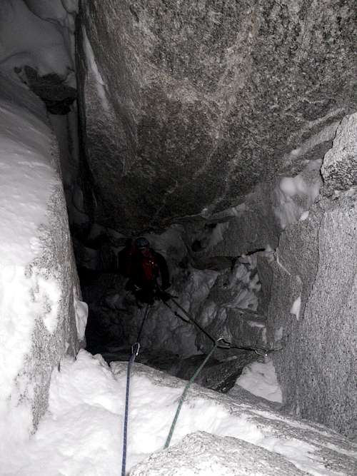 Climbing under a huge jammed boulder