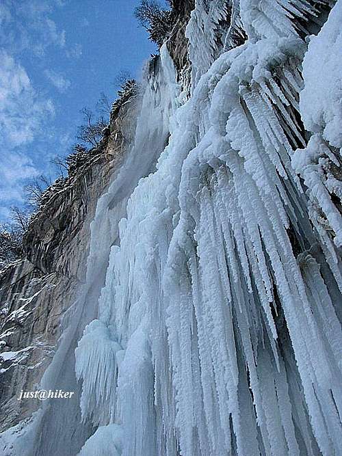 Icicles of half-frozen waterfall