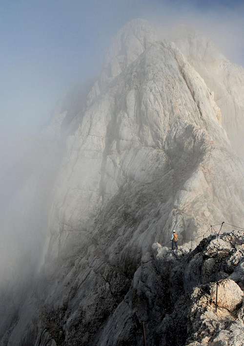 Ascending Triglav in Mist