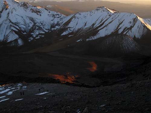 The early morning sun, coming over the pass