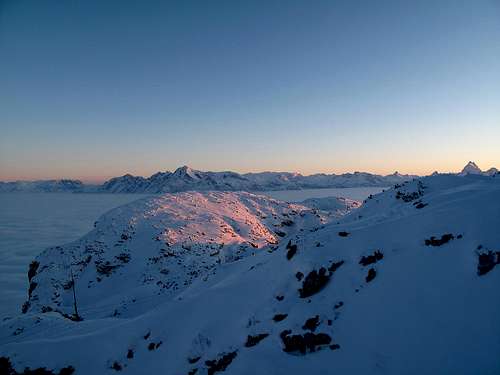 Going down a very wintry Untersberg during sunset
