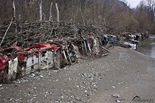 By the river of... wrecked cars