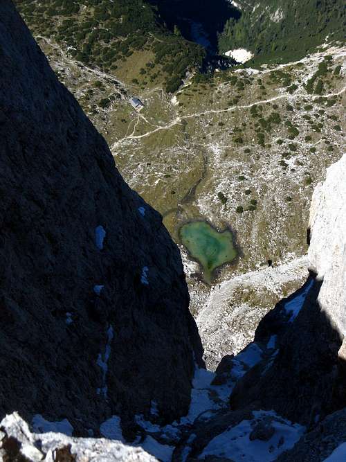 A small lake seen from Cima Ovest di Lavaredo summit ridge